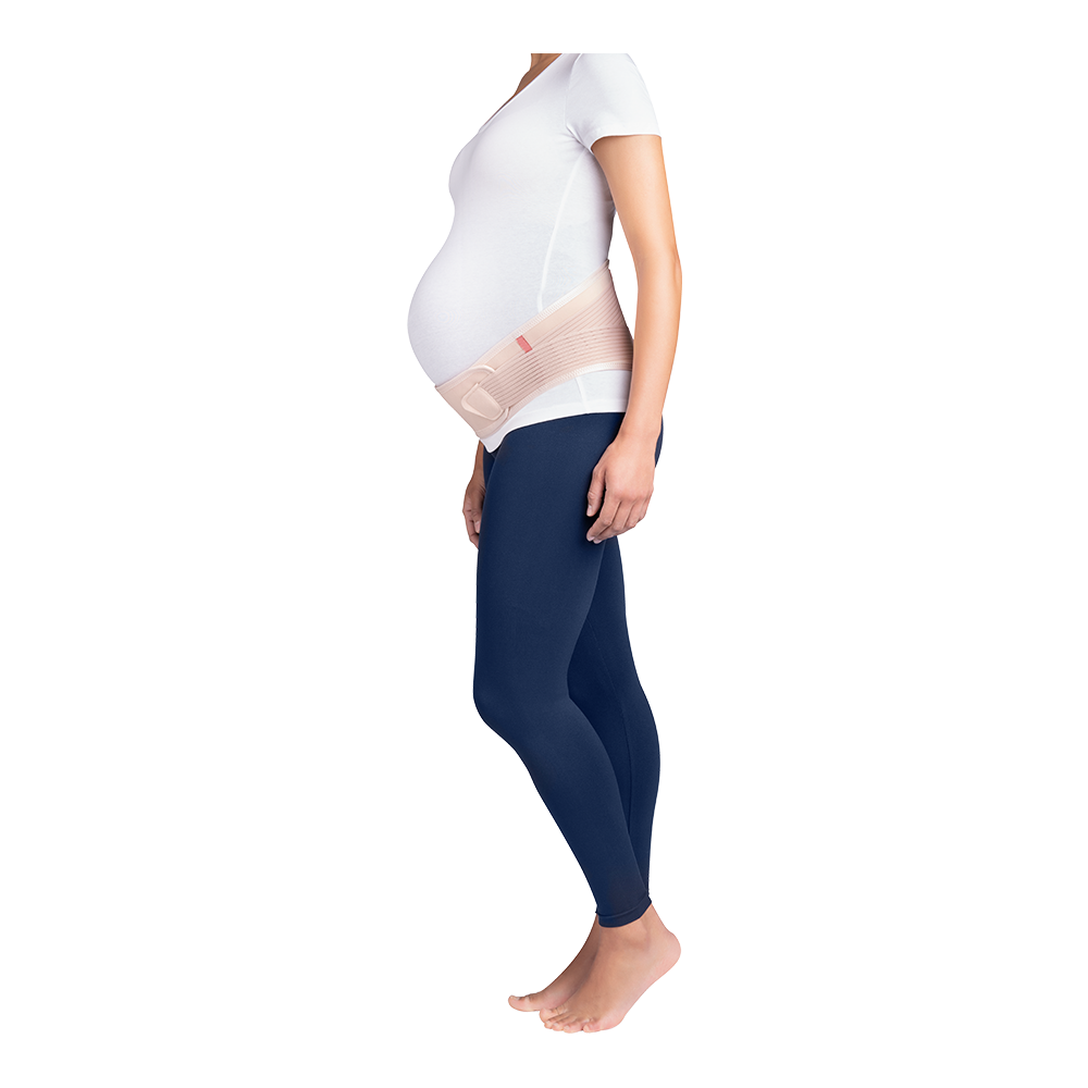 Left-facing, full-body view of a pregnant woman wearing a rose-colored JOBST Maternity Support Belt.
