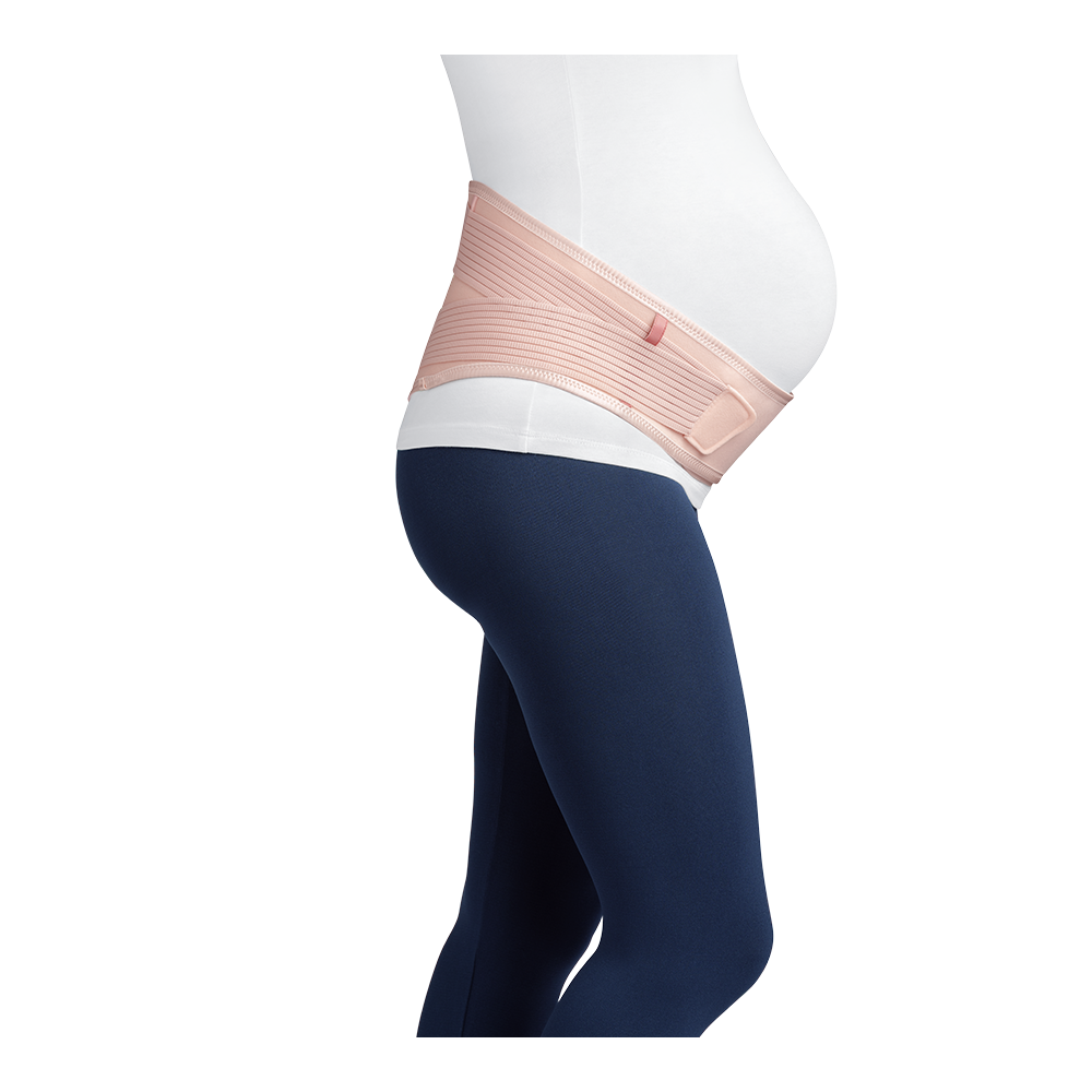 Close-up view from belly to knee of a pregnant woman wearing a rose-colored JOBST Maternity Support Belt.