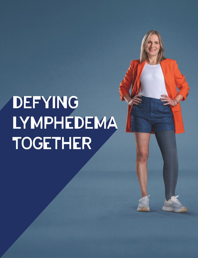 Poster of Julie in an orange blazer and grey compression garment on her leg. The text reads: Defying lymphoedema together.